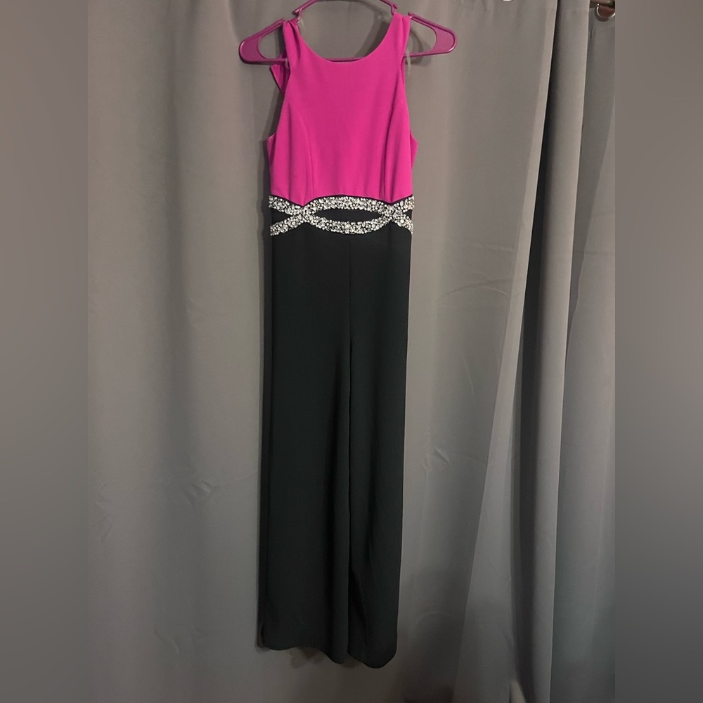 Xtraordinary brand, Pink and Black Jumpsuit, with Pearled waistline design.